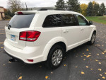 2018 Dodge Journey SXT FWD in excellent condition, white color, parked with autumn leaves around.
