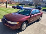 2002 Buick Century Special Edition in excellent condition with low mileage parked in driveway