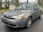 2011 Ford Focus SE Sedan in gray color, featuring power windows, clean title, and ice-cold A/C.