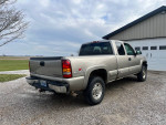 2000 Chevrolet 2500 truck with 330k miles, ideal for work or farm, showing some rust but solid frame.