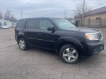 2014 Honda Pilot EX-L FWD in black with leather interior parked outside, ideal for fixer upper or parts