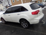 2008 Acura MDX SUV parked, featuring third-row seats and premium sound system