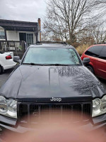 Front view of a black 2007 Jeep Grand Cherokee with heated leather seats and remote start