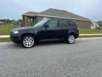 2007 BMW X3 in excellent condition with 126,271 miles, featuring a sleek black exterior and luxury leather interior.