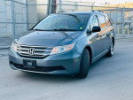 2013 Honda Odyssey EX in excellent condition, featuring rear view camera and alloy wheels, ideal for families.