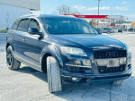 2013 Audi Q7 3.0T Premium Plus quattro in black, showcasing sleek design and modern features.