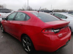 2014 Dodge Dart GT in red with alloy wheels parked among other cars, featuring clean design and rear view camera.