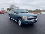 2011 Chevrolet Silverado 1500 LT 4WD in blue with clean title, new battery, and detailed exterior.