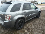 2005 Chevrolet Equinox LT AWD in gray with new paint and detailed interior, showcasing its mechanics and exterior features.