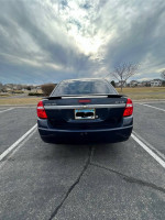 2006 Chevrolet Malibu LT V6 parked with low mileage and clean interior in a parking lot