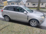 2009 Saturn VUE AWD with 79,000 miles, showing exterior details and a snowy driveway.