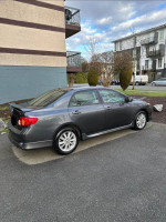 2009 Toyota Corolla S for sale, gray sedan parked outside with clear title and new tires.