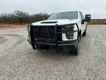 2021 Chevrolet Silverado 2500HD Work Truck with front bumper and gooseneck hitch on gravel road