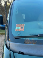 2010 Chevrolet Express cargo van with inspection sticker for sale, green exterior, in good condition, 140,000 miles.