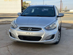 Front view of a 2015 Hyundai Accent GLS FWD for sale in Lubbock, Texas, with 144,000 miles.