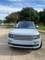 Front view of a 2016 Land Rover Range Rover HSE 4WD in pristine condition, showcasing its luxury design.