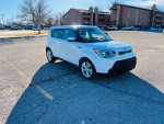 2015 Kia Soul in white color parked in a lot, showcasing its automatic transmission and low mileage.