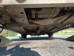 Underside view of a 2006 Monte Carlo showing its transmission and minimal rust.