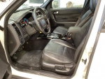 Interior of 2012 Ford Escape Limited with leather seats and dashboard features