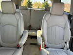 Interior view of 2012 GMC Acadia Denali with leather seating for seven and high-quality finishes.