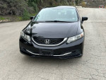 2015 Honda Civic LX in black, low mileage, fuel-efficient 4-cylinder engine, equipped with Bluetooth and backup camera.