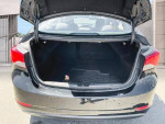 Trunk of 2013 Hyundai Elantra GL showcasing clean and spacious storage area for everyday use.