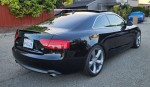 2010 Audi A5 3.2 Premium Plus quattro in black, showcasing sleek design and stylish rear view.