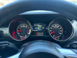 Interior view of a 2015 Ford Mustang GT showcasing the dashboard and instrument cluster.
