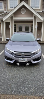 2016 Honda Civic EX FWD in silver color, parked outside. Features sunroof, backup camera, and advanced safety systems.