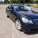 2007 Infiniti M35 luxury sedan in blue color with low mileage and rear camera features.