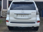 Rear view of a well-maintained 2016 Lexus GX 460 Premium SUV, showcasing its sleek design and clean lines.