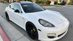 2011 Porsche Panamera 4 AWD in white with black leather interior, low mileage, and excellent condition