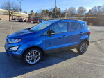 2020 EcoSport SES subcompact SUV in blue parked, showcasing its design and features.