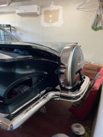 Rear view of a 1959 Chevrolet Impala showcasing chrome details and upgraded features.