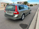 2008 Volvo V70 3.2 wagon parked on the street, showcasing its sleek design and gray color.