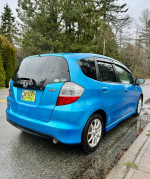 2009 Honda Fit Sport FWD in blue, showcasing a clean exterior and well-maintained condition with no accidents.