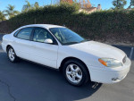 2004 Ford Taurus SES FWD in white, showing exterior features, low mileage and clean title.
