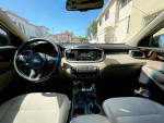 Interior view of a 2016 Kia Sorento L FWD showcasing the dashboard and seating area