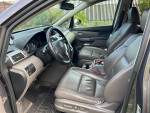 Interior view of 2014 Honda Odyssey EX FWD with leather seats and dashboard features