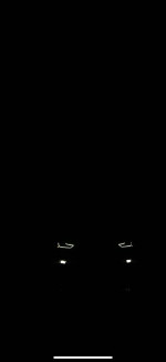 2013 Audi A4 2.0T Premium in low light, showcasing headlights, clean lines and premium design.