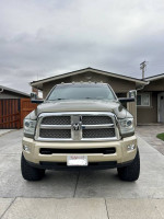 Front view of a 2014 Ram 3500 Longhorn with custom features and new upgrades for sale.