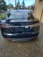 2014 Tesla Model S 85 in excellent condition with lifetime supercharging and premium features