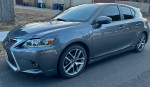 Gray 2015 Lexus CT 200h in excellent condition with low mileage, showcasing luxury and economy features.