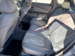 Interior view of a 2024 Chevrolet Malibu with spacious back seat and clean upholstery.