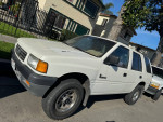 Honda Passport for sale, 79,000 miles, reliable stick shift with clean interior and current registration.