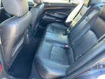 Interior view of a well-maintained 2007 Infiniti G35 sedan with black leather seats.