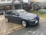 2009 MAZDASPEED 3 in excellent condition, fully loaded with modifications, parked in a residential area.