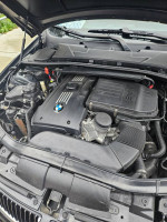 Engine bay of a 2007 BMW 335i with twin turbo and new parts