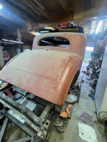 1934 Pontiac Coupe rear view, showcasing its vintage design and solid bodywork for car enthusiasts.