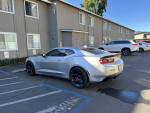 2018 Chevrolet Camaro 1SS in silver color parked, showcasing 1LE performance package and sleek design.
